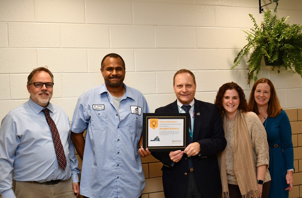 Mr. Sanker receiving spotlight award