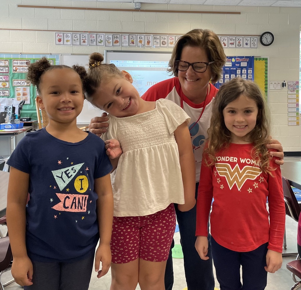 AGR students and teacher wearing red, white and blue