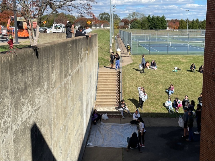 students dropping eggs