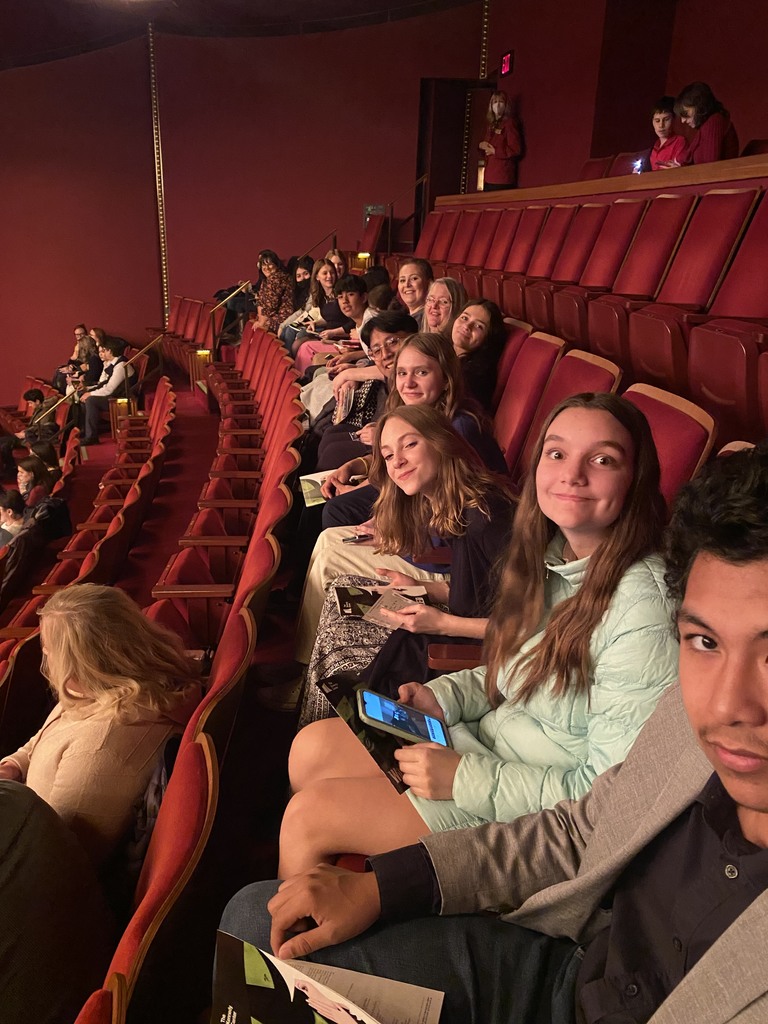 A picture of some of the theatre kids in their aisle seats at the show