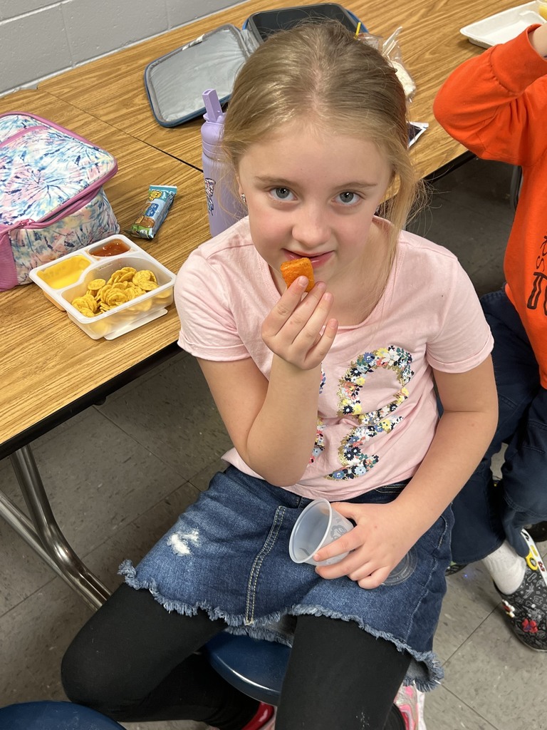 child eating butternut squash