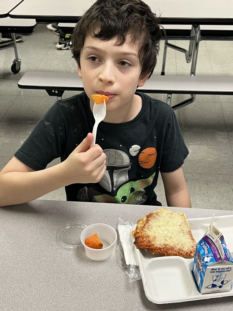 child eating butternut squash