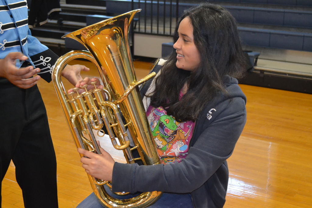 Student tries out an instrument.