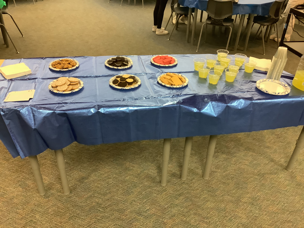 a picture of the table with cookies and lemonaide 