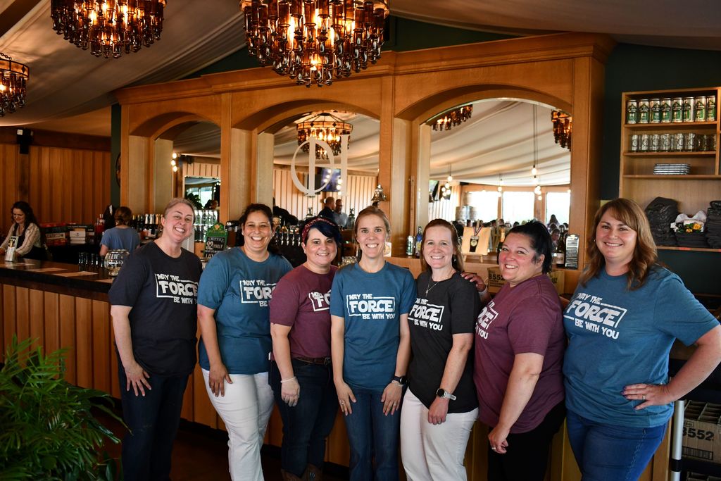 Group wearing matching May the Force be with you shirts 