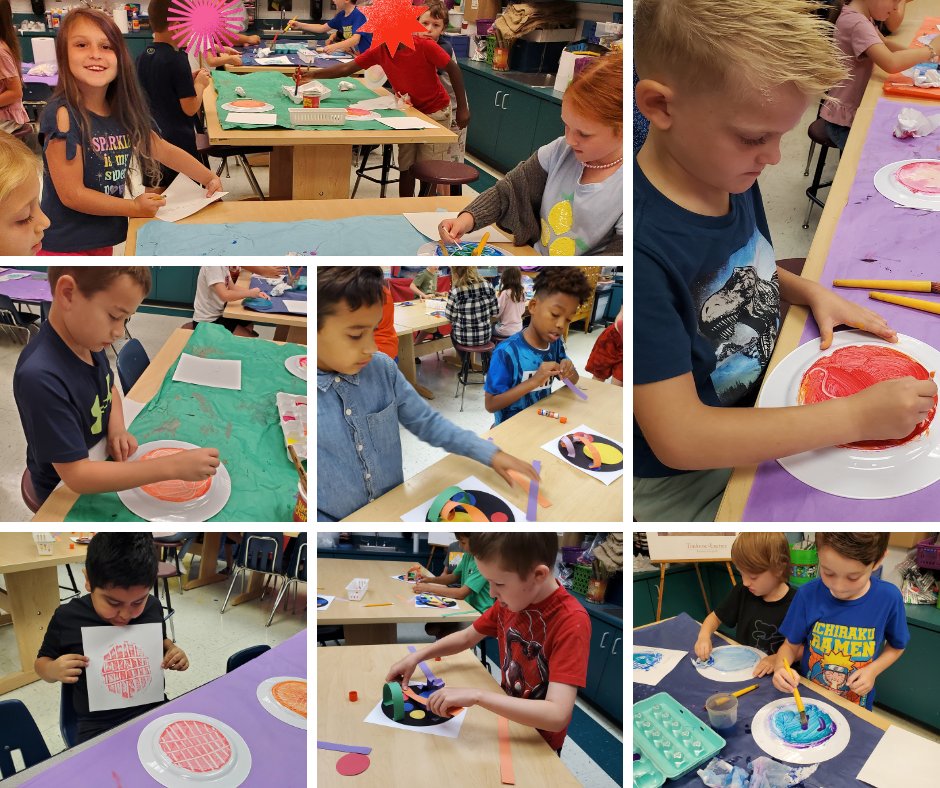 Students in art class making dots for dot day