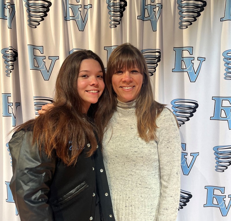 Senior Elle Castro wearing her new academic letter jacket with her mom Beth Castro